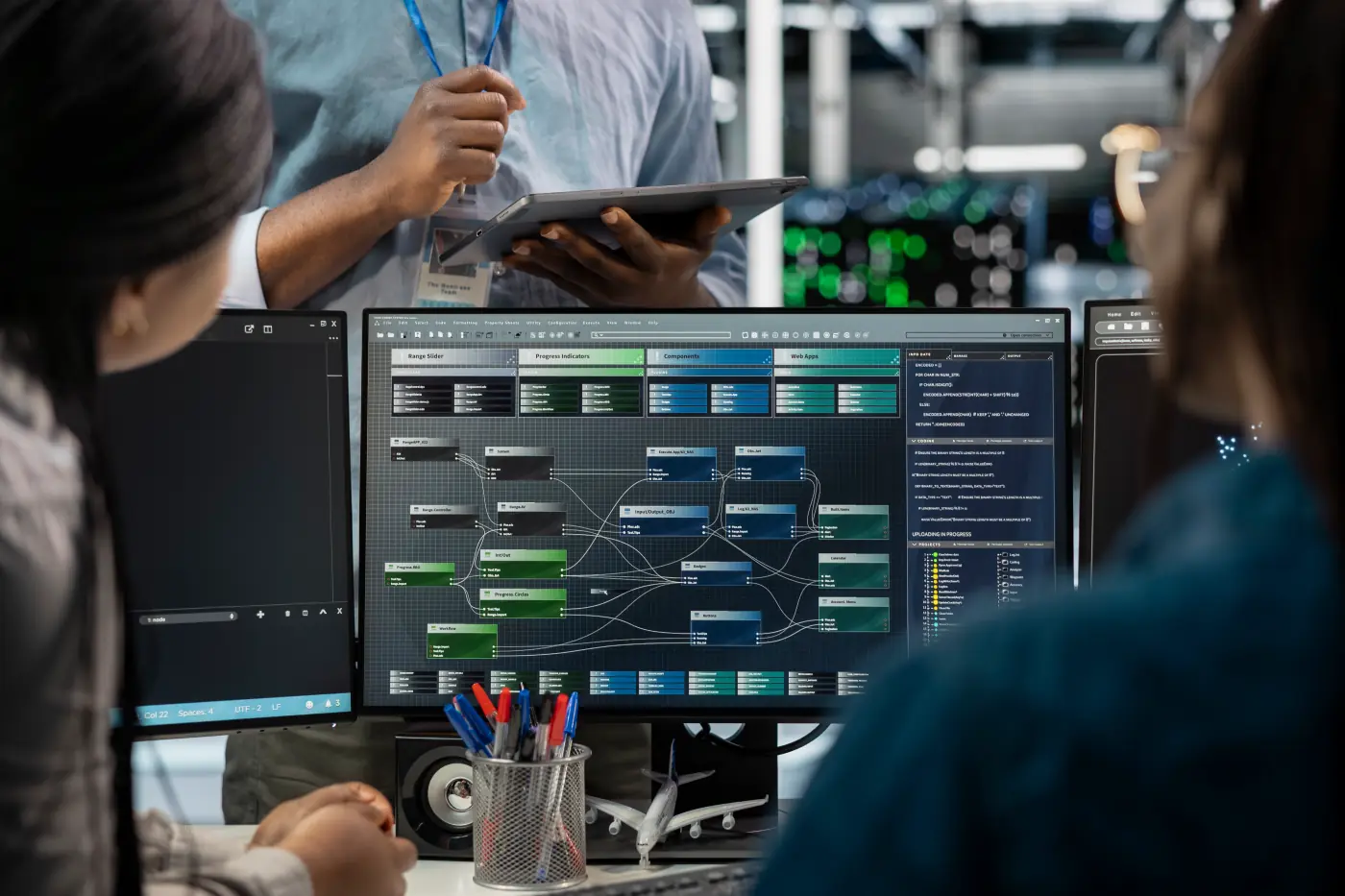 Close up data center programmers using pc visualize ai neural networks
